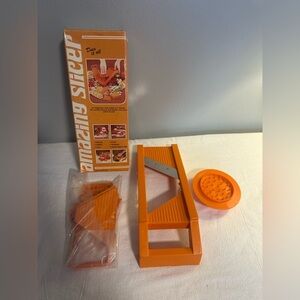 AMAZING SLICER  NEW IN‎ BOX MCM ORANGE